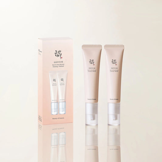 Beauty of Joseon Revive Eye Serum Ginseng + Retinal 30ml pink box beside two beige serum tubes on light background