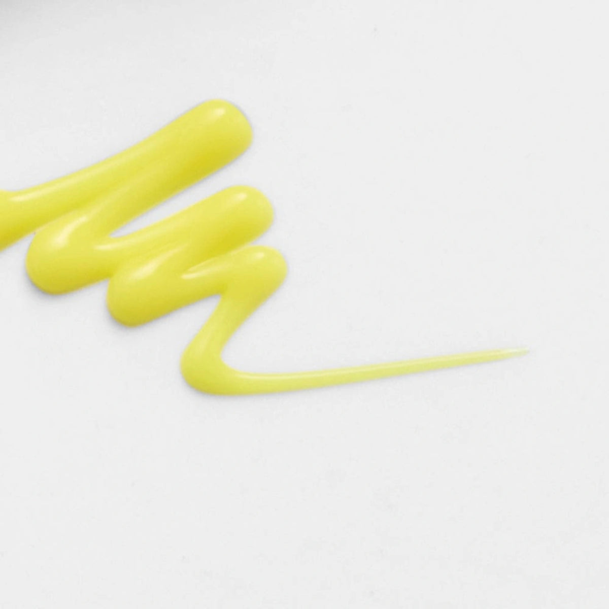 celimax Vita A Retinal Shot Tightening Booster 15ml - neon yellow booster texture swatch smeared on white background