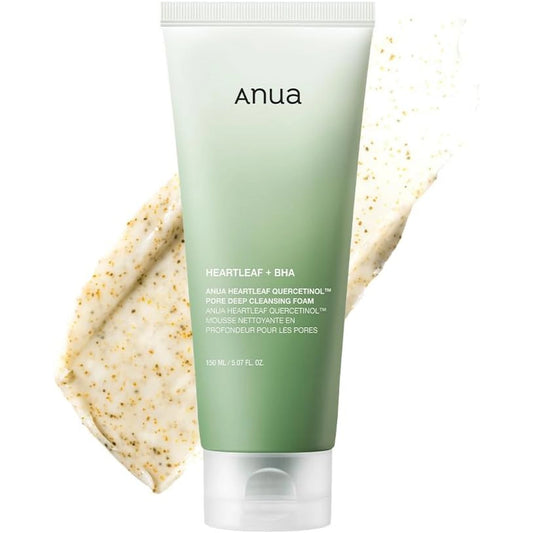 Anua Heartleaf Quercetinol Pore Deep Cleansing Foam 150ml green gradient tube with a smear of speckled cream cleanser behind it