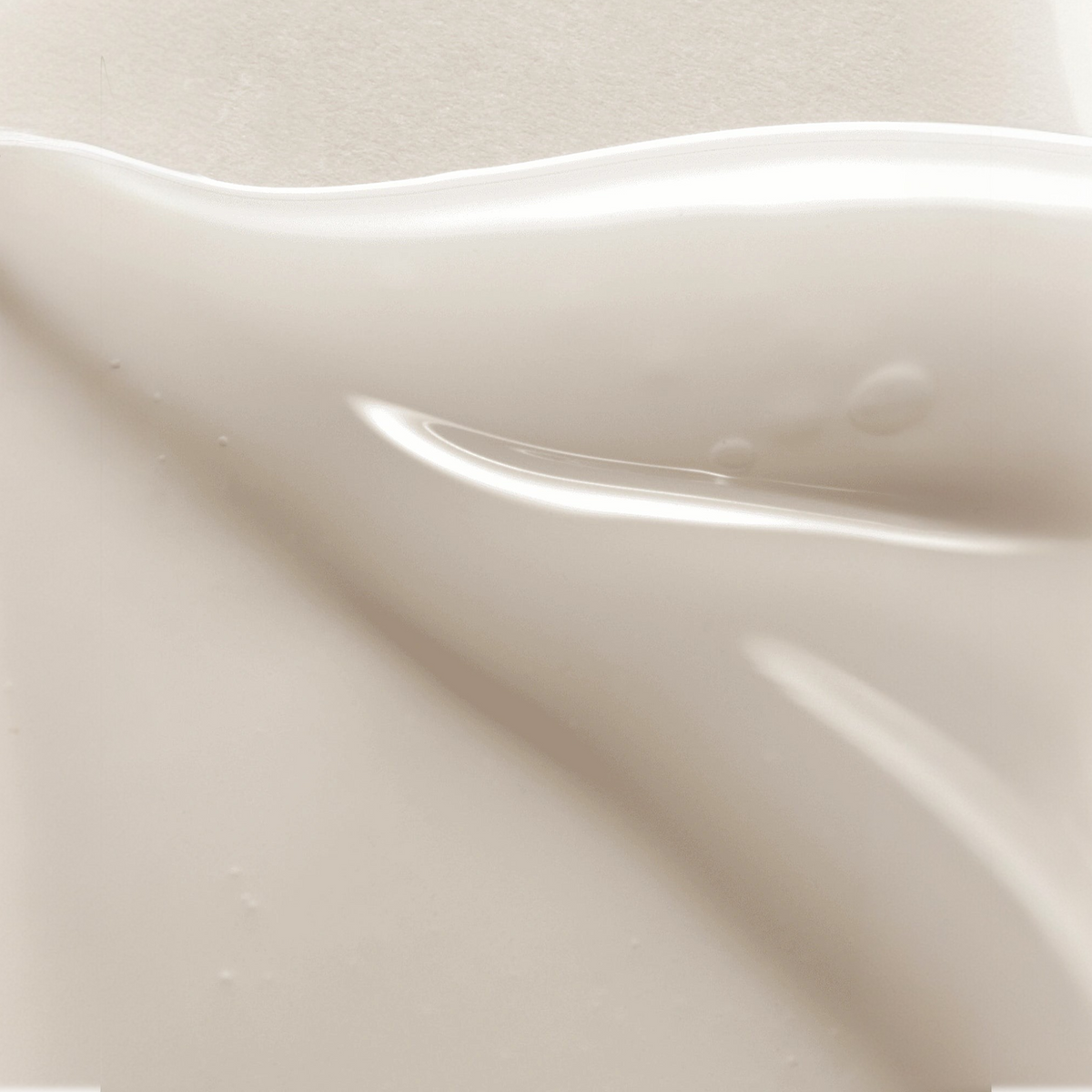 AXIS-Y Dark Spot Correcting Glow Serum 50ml texture swatch showing sheer glossy gel-cream smear