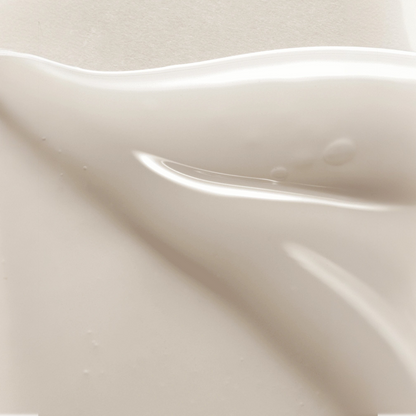 AXIS-Y Dark Spot Correcting Glow Serum 50ml texture swatch showing sheer glossy gel-cream smear