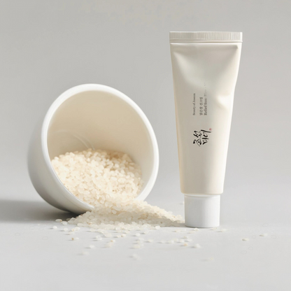 Beauty of Joseon Relief Sun: Rice + Probiotics SPF50+ PA++++ 50ml tube standing beside a tipped bowl of white rice grains