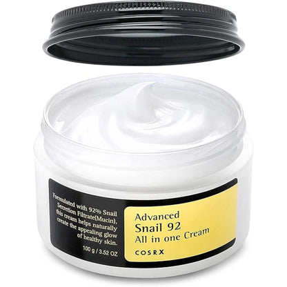 Open jar of COSRX Advanced Snail 92 All in One Cream showing the white gel-cream texture and label with 100 g / 3.52 oz size