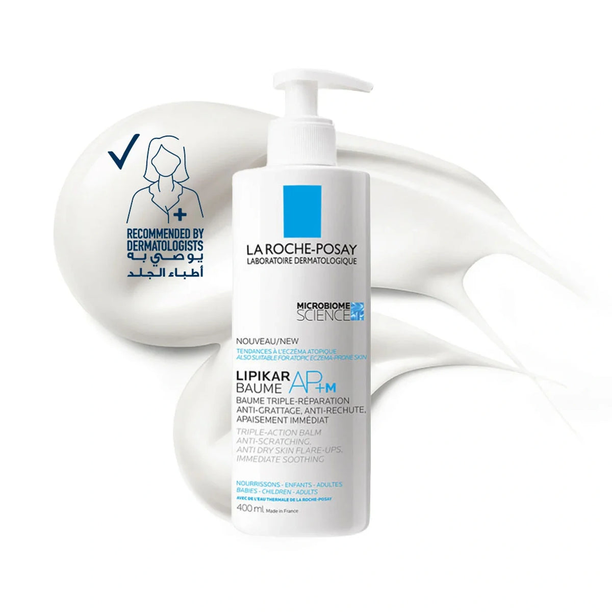 La Roche-Posay Lipikar Baume AP+M 400 ml pump bottle standing against a swirl of white balm, next to a 'Recommended by Dermatologists' badge with Arabic text.