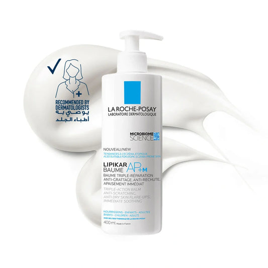 La Roche-Posay Lipikar Baume AP+M 400 ml pump bottle standing against a swirl of white balm, next to a 'Recommended by Dermatologists' badge with Arabic text.